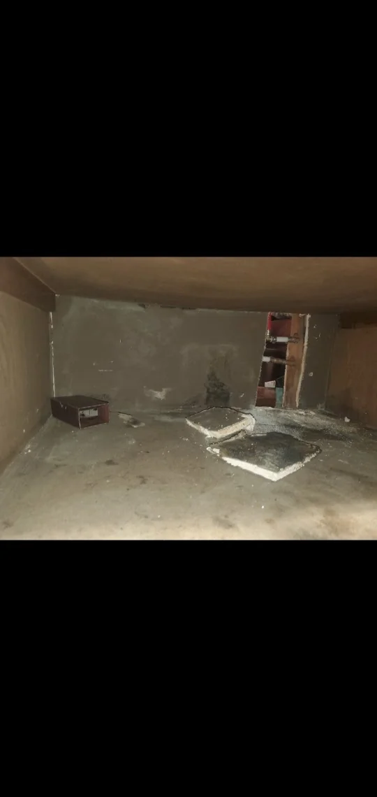 Water damage and visible growth inside a cabinet during an Oklahoma City inspection